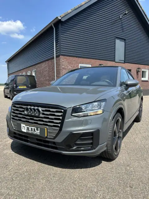 ontchromen audi voor links na